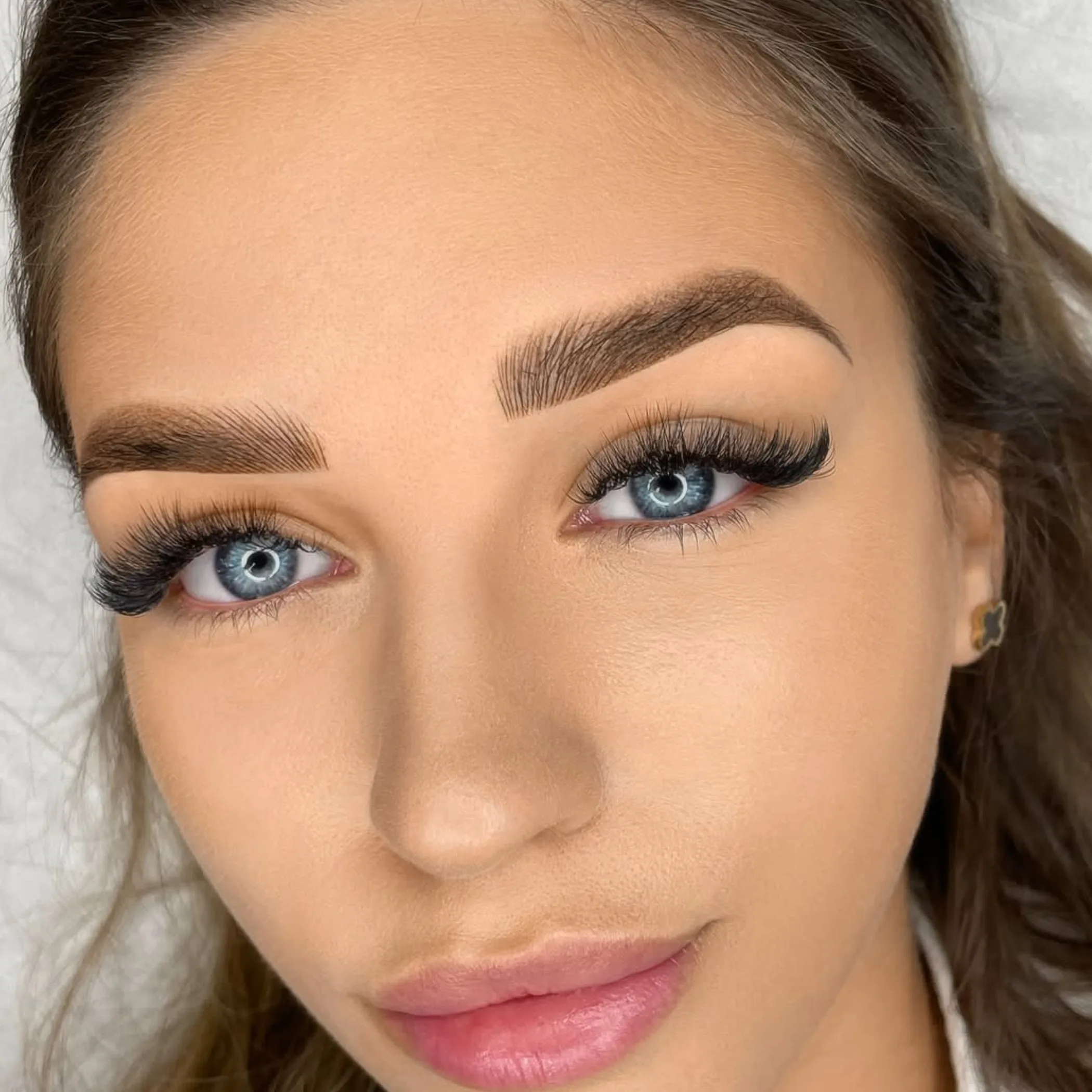 close-up of eyebrow tattooed skin